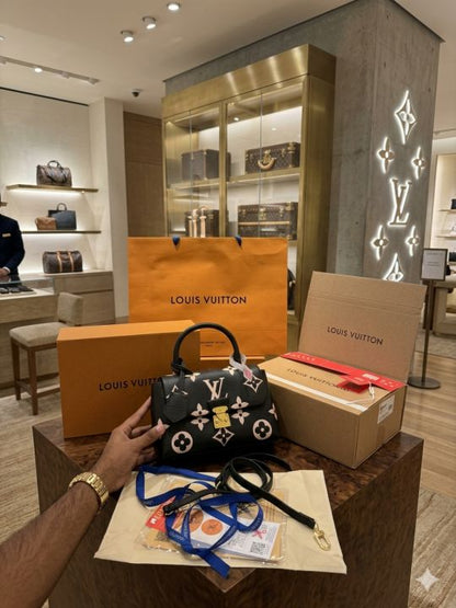 louiis vuitton madeleine handbag with packing box